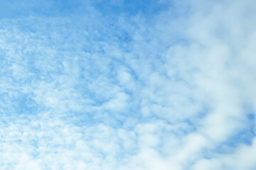 Blue sky with cloudy haze. Celestial atmospheric background
