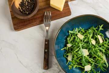  Arugula and parmesan salad in a bowl