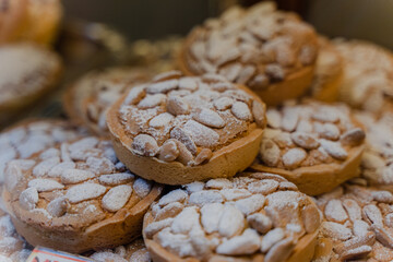 Cakes. Many desserts are on display. General plan.