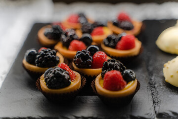 Cakes. Many desserts are on display. General plan.