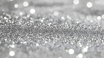 Fototapeta premium Sparkling silver glitter texture background for design and decoration purposes