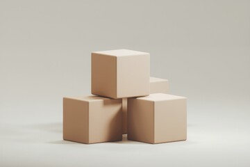 Obraz premium Four beige cubes stacked on a white surface.