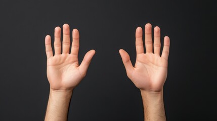Open Hands Raised Against a Dark Background Symbolizing Help, Surrender, and Communication