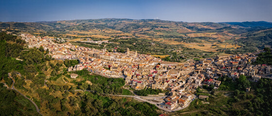 Panoramic aerial picture of Vizzini at sunset. Vizzini - picturesque Italian city in Sicily. June 2023