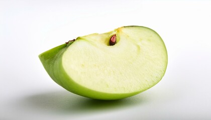 A juicy slice of green apple against a bright white background.