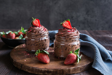 Chocolate mousse topped with fresh and freeze-dried strawberries
