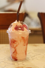 Strawberry smoothie on the table