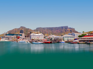 Long exposure shot of the waterfront with Cape Town city and Table Mountain in the background, South Africa