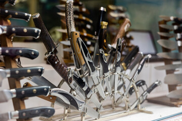 Fototapeta premium Knives collection in showcase of souvenir shop of Toledo, Spain.