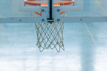 back of a basketball hoop in sports complex building