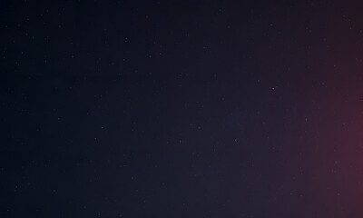 Fototapeta premium The night sky is filled with countless stars in dark deep space perfect for astronomy, astrology, and stargazing-themed designs and projects