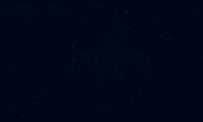 Fototapeta premium The night sky is filled with countless stars in dark deep space perfect for astronomy, astrology, and stargazing-themed designs and projects