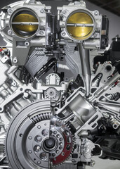 Shiny new automotive engine V4 Rear Throttle Body with cut section showing inside details.