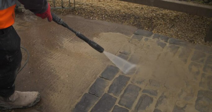 Water power washer jet stream hose cleaning paving stones pavement garden patio