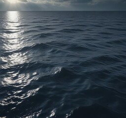 Fototapeta premium Dark blue ocean surface with ripples and sunlight filtering down, calm, wave