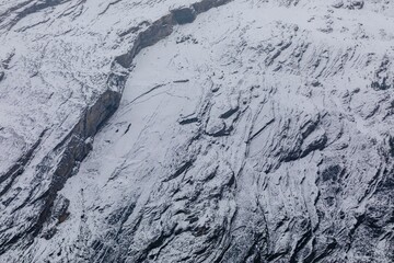 Snowy mountain rock face texture. Nature's intricate patterns. Winter landscape. , Jasper National...