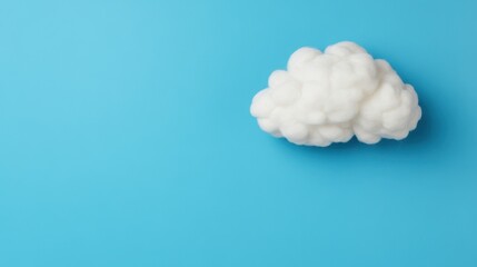 Fluffy cloud on vibrant blue background: minimalist concept of nature and simplicity