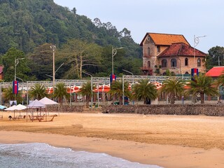 Golden Sands and Tranquility at Kep Beach - Kaeb Beach, Cambodia. Unwind at Kep Beach, Cambodia, where golden sands meet gentle waves and a serene tropical ambiance at Kaeb Beach Cambodia.