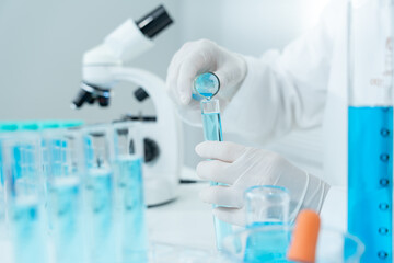 Fototapeta premium Scientist analyze biochemical sample in advanced scientific laboratory. Medical professional check chemical mix microbiological developmental of viral. Biotechnology research in science lab. cosmetic