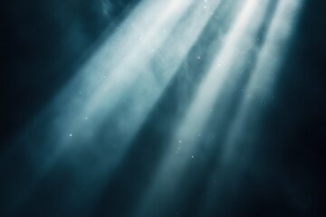 Obraz premium Light rays filtering through dark misty background, creating mysterious and ethereal ambiance atmosphere