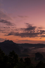 Vertical Horizon Sunset mountain range beautiful landscape mist foggy sunrise beam. Golden sky Mountain landscape mountain. Vertical Amazing Landscape cloud sky on sunrise. Gold sunlight heaven scene