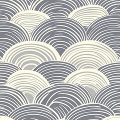 A pattern of waves is shown in a gray and white color scheme