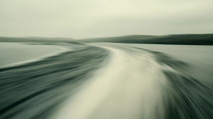 Winding road through misty landscape, travel background