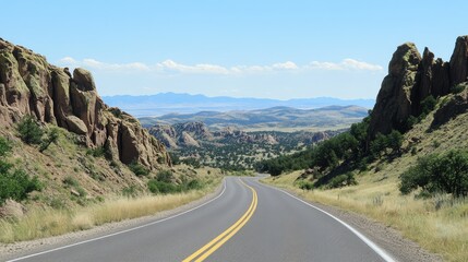 Fototapeta premium A scenic highway winding through an alpine landscape, crisp mountain air and clear skies