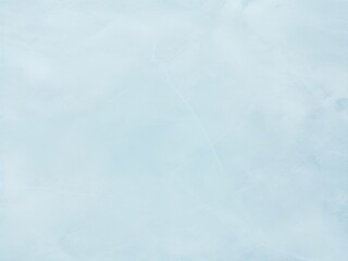 Abstract textured background resembling a frozen ice surface in soft blue tones. Perfect for winter-themed designs, holiday backdrops, or minimalist projects.