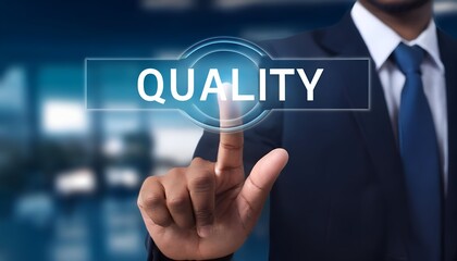 Fototapeta premium business hand pushing quality button on blurred background. Quality Concept 