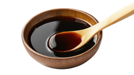 Rich and Glossy Soy Sauce: A wooden bowl brimming with dark, glossy soy sauce, a wooden spoon resting inside, ready to enhance culinary creations.