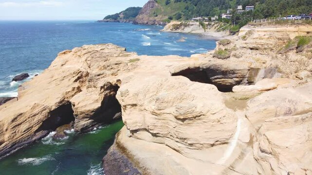 Devils Punch Bowl. State Park Natural Area on the Oregon Coast, USA. Highway 101 Tourist Sightseeing Destination. Cave Opening With Hole in Ground Showing Water Below. Sink Hole to Pacific Ocean
