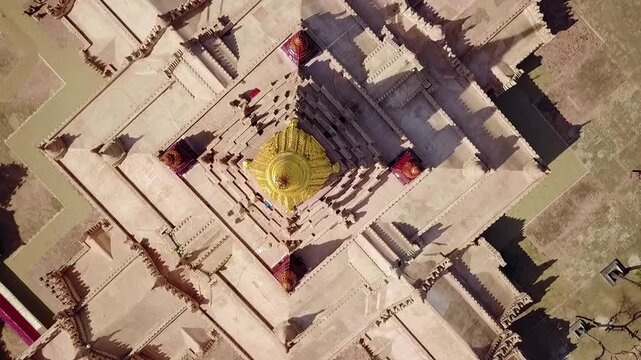 A captivating bird's-eye aerial view showcasing the golden Sertok of the White Temple at Ananda Temple, Bagan, Myanmar. Highlights the temple's intricate design and rich historical legacy.