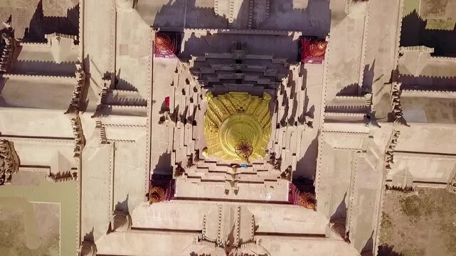 A breathtaking top-down view of the White Temple at Ananda Temple, Bagan, Myanmar, highlighting the gleaming golden Sertok and intricate architectural design in a serene spiritual setting.