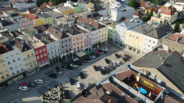 Ried im Innkreis square with colorful facades, Austrian town charm, drone, 4k
