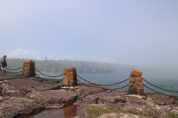 Naklejka premium Foggy view from the top of the rock formation on Lake Superior 