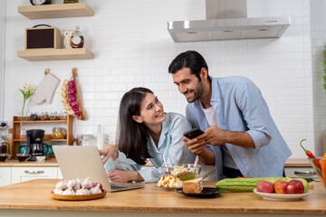 Happy excited young Caucasian couple feel euphoric with good email, get amazing sale offer or discount deal on computer.