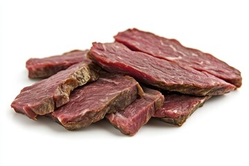 Fototapeta premium Sliced African Biltong Stacked on White Background