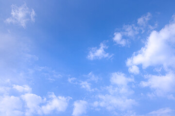 clean air daytime bright blue sky and clouds.view of blue sky with shining sun. White fluffy clouds on a blue sky. spring season.sky background texture.