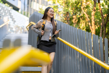 University student with backpack and book, campus life education journey, young asian woman ready for class, studying and learning, academic lifestyle college campus background, knowledge and growth