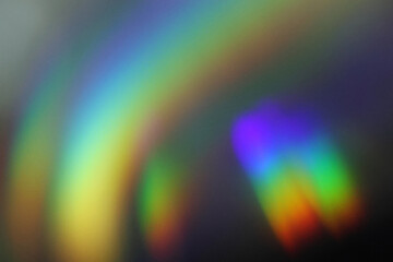 Sunlight shining through a glass crystal, background is black for a perfect overlay effect.