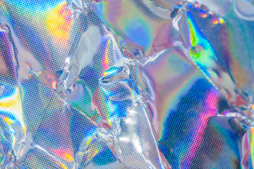Holographic rainbow wrinkled foil iridescent texture abstract hologram background