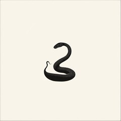 Black Snake Coiled In An Elegant Pose