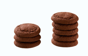 Stack of round chocolate cookies isolated on white background.