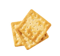 Stack of square water crackers isolated on white background, top view. Water crackers placed on top of each other on a white background, top view.