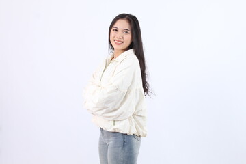 Woman Smiles with Arms Crossed in Stylish Outfit on White Background, Confident Pose, Fashion, Style, Lifestyle