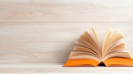 Open book on wooden background, reading, knowledge, education, study, literature, website banner