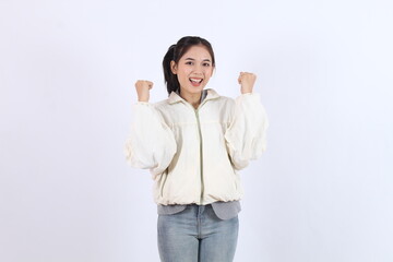 Woman Celebrates Success Enthusiastically with Excitement on White Background