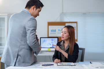 Business Professionals Engaging in Office Discussion