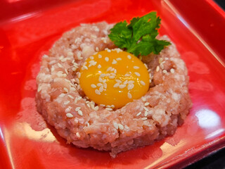 Raw Meat Dish with Egg Yolk and Sesame Seeds